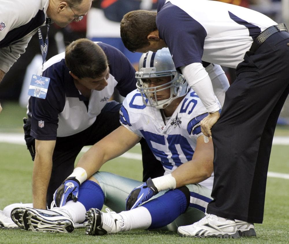 Sean Lee of the Dallas Cowboys, pictured in December 2010, is one of countless players who have suffered concussions during their careers. Now some of them are suing the NFL. (AP)