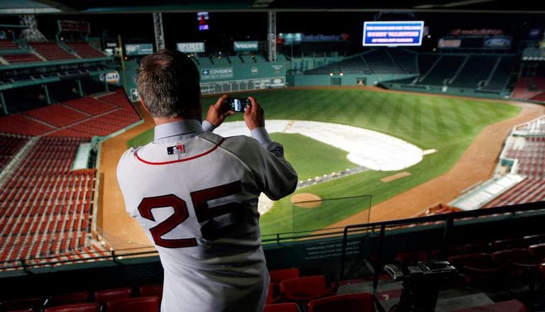 Bobby Valentine takes a picture of Fenway Park after being introduced as the 45th manager in Red Sox history on Dec. 1, 2011. (AP)
