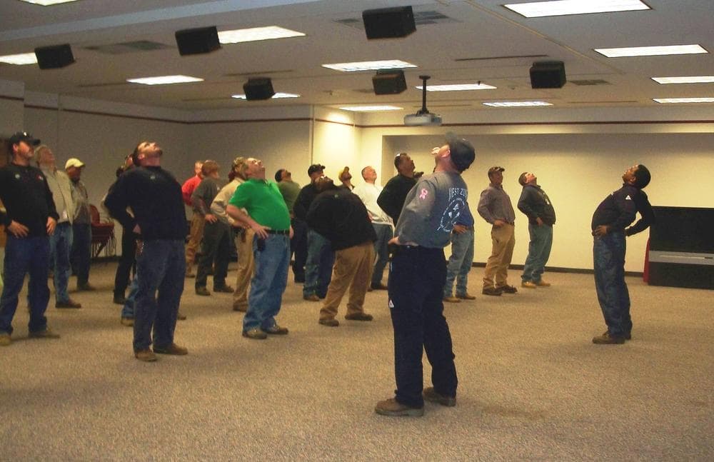 Workers taking part in a morning stretching routine at Duke Energy. (Duke Energy Corp.)