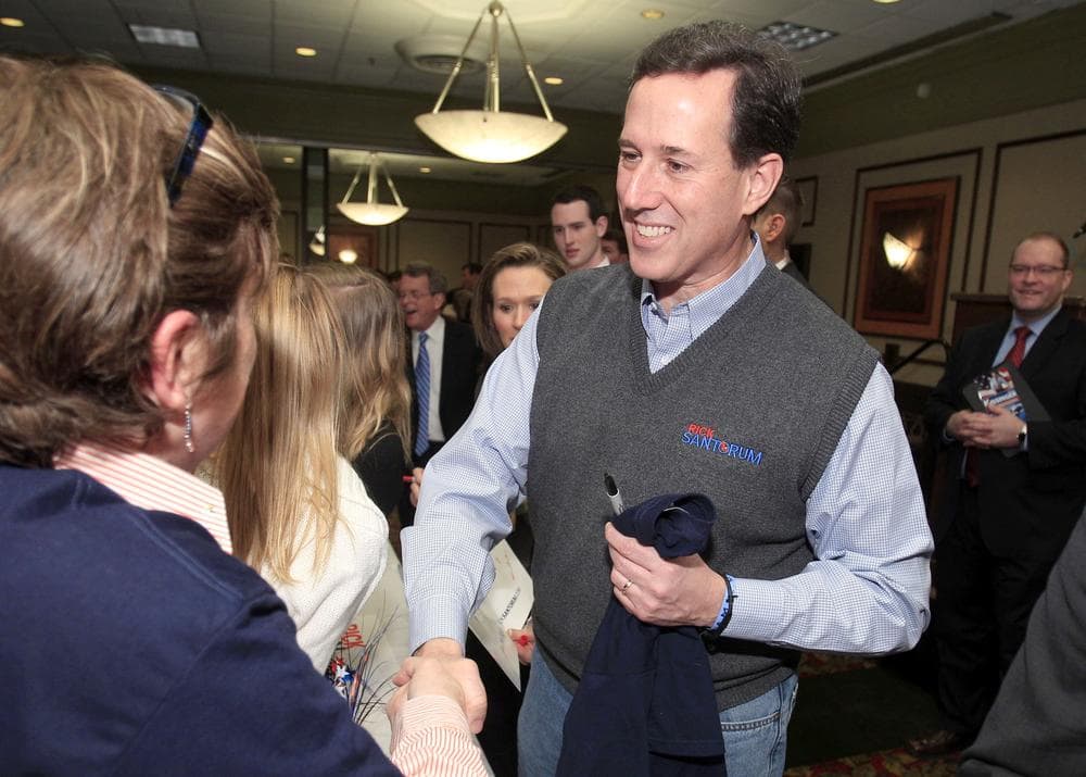 GOP presidential candidate, former Pennsylvania Sen. Rick Santorum greets supporters in Perrysburg, Ohio, Tuesday. (AP)