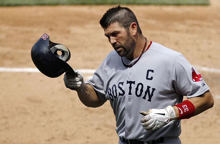 Jason Varitek trots back to the dugout after a 2011 home run against the Phillies. Varitek is retiring after 15 seasons with the Red Sox. (AP)