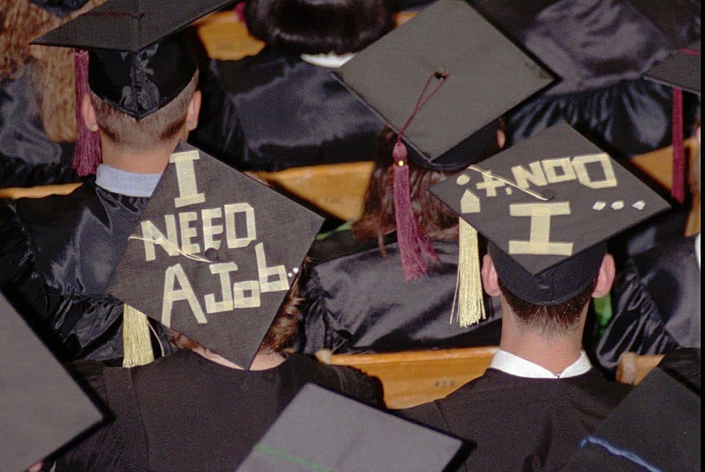 College graduates (AP Photo/Mark Hall)