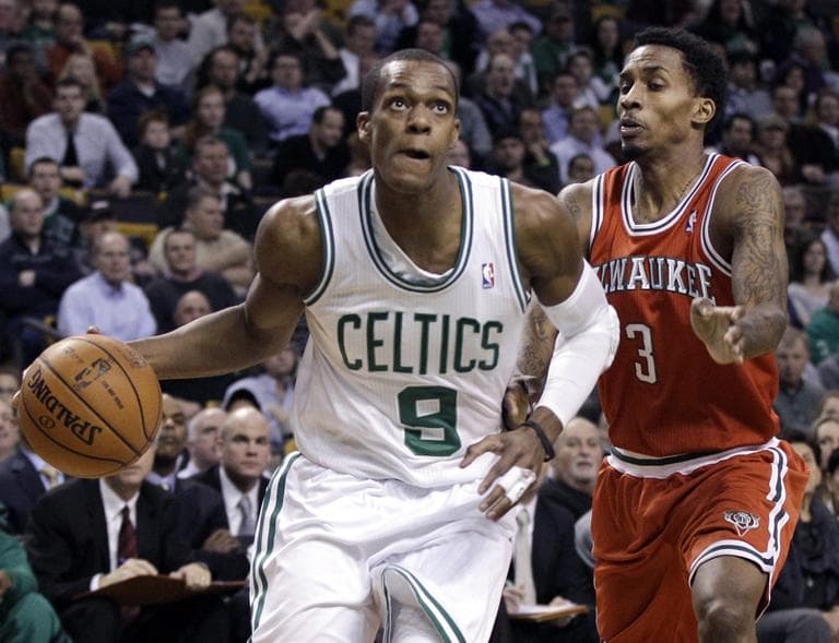 Celtics guard Rajon Rondo drives past Milwaukee Bucks guard Brandon Jennings during the first half of an NBA basketball game in Boston Wednesday. (AP)