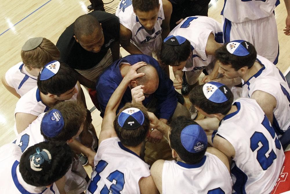 Beren Academy players huddle during the final timeout of their semifinal basketball game against Covenant on Friday. Beren won the game 58-46. (AP)