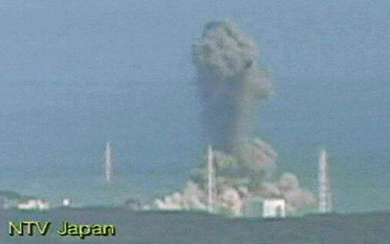 In this image made from Japan's NTV/NNN Japan television, smoke ascends from the Fukushima Dai-ichi nuclear plant's Unit 3 in Okumamachi, northern Japan, Monday, March 14, 2011. The second hydrogen explosion in three days rocked Japan's stricken nuclear plant Monday, sending a massive column of smoke into the air and wounding 11 workers. (AP)
