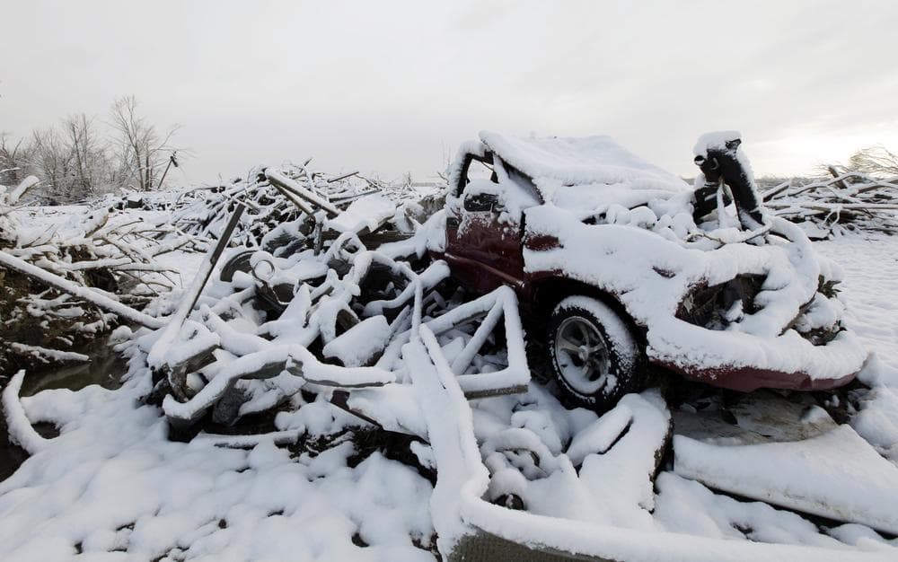 Snow covers a damaged truck after Friday&#039;s tornado in Marysville, Ind. (AP)