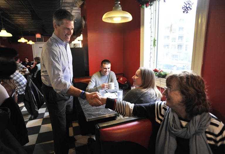 Sen. Scott Brown greets supporter Jo MacDonald of Salem, Mass., right, at Mul&#039;s Diner in Boston, Wednesday, Dec. 28, 2011. (AP)