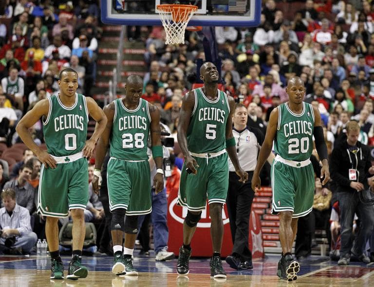 Avery Bradley, Mickael Pietrus, Kevin Garnett, and Ray Allen walk off the court during a break in the action in the first half of an NBA basketball game with the Philadelphia 76ers Wednesday. (AP)