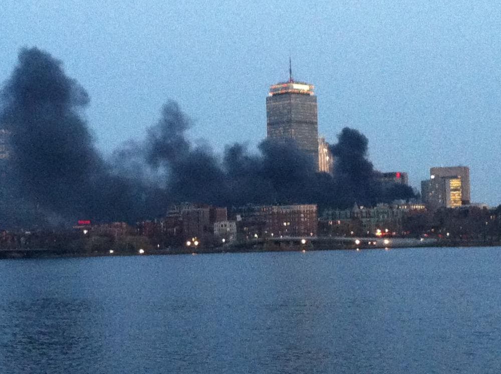 Smoke from the electrical fire as seen from Memorial Drive in Cambridge, Mass. (Bianca Vazquez Toness/WBUR)