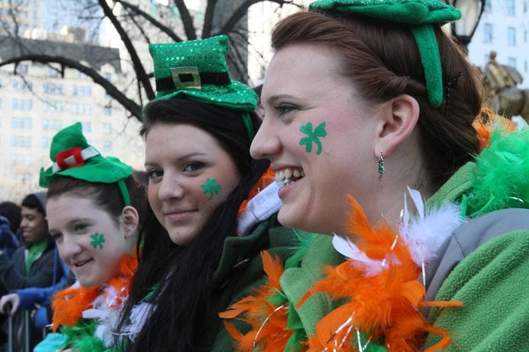 Danielle McElduff, 19, right, smiles as she and her sisters Lauren McElduff, 15, left, and Aidan McElduff, 16, wait for the start of the St. Patrick's Day Parade Thursday, March 17, 2011 on Fifth Avenue in New York. The sisters are from Cornwall, New York. (AP)