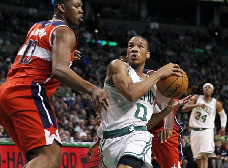 Boston Celtics&#039; Avery Bradley drives past Washington Wizards&#039; Kevin Seraphin in the second quarter of an NBA basketball game in Boston, Sunday. (AP)