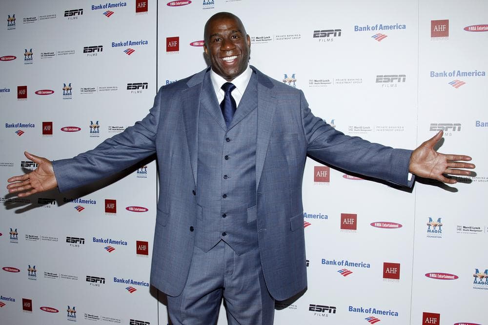 Magic Johnson was already larger than life in Los Angeles, but now that he's a part-owner of the Dodgers, his stature could become even larger. (AP)