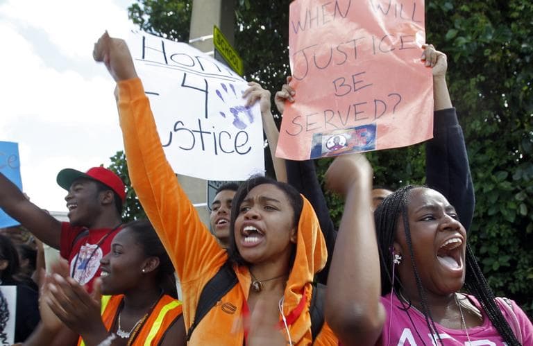 High School students chant during a rally demanding justice for Trayvon Martin, Friday, in Miami Gardens, Fla. Neighborhood crime-watch captain George Zimmerman claimed self-defense and has not been arrested, though state and federal authorities are still investigating. (AP)