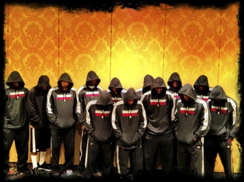 In this image posted to Miami Heat basketball player LeBron James&#039; Twitter page, Miami Heat players wear team hoodies in response to the shooting of unarmed teenager Trayvon Martin, who was wearing a hoodie. (AP/LeBron James via Twitter)