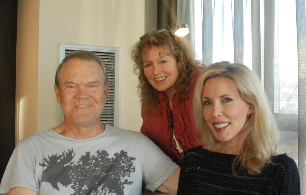 Here & Now's Robin Young (center) visited with Glen Campbell and his wife Kim on the day of his recent show at The Wilbur Theater in Boston. (Alex Ashlock/Here & Now)