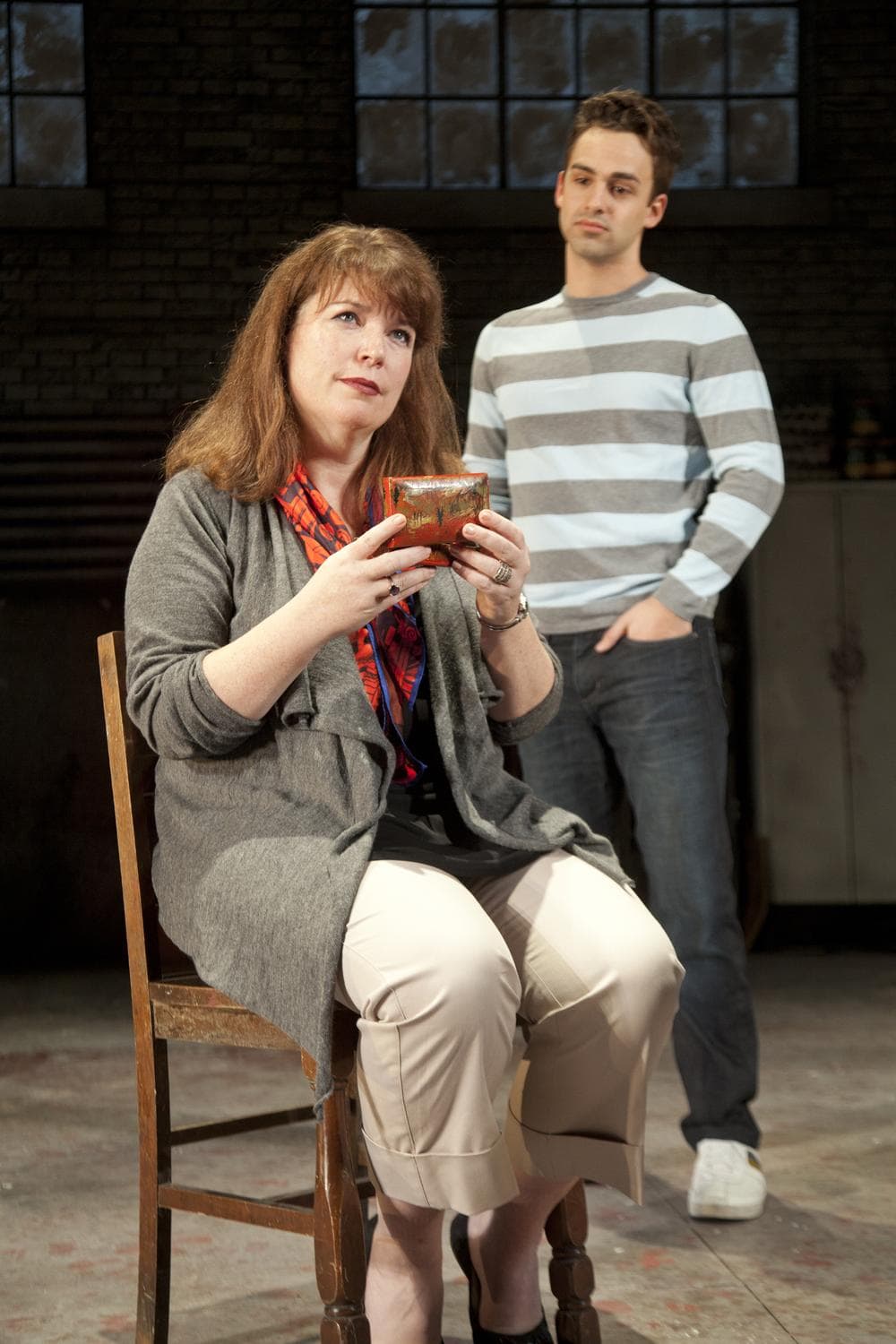 A music box brings back some painful memories for a mother and son (Kerry A. Dowling and Michael Tacconi) in a scene from Next to Normal  (Saglio Photography Inc.)