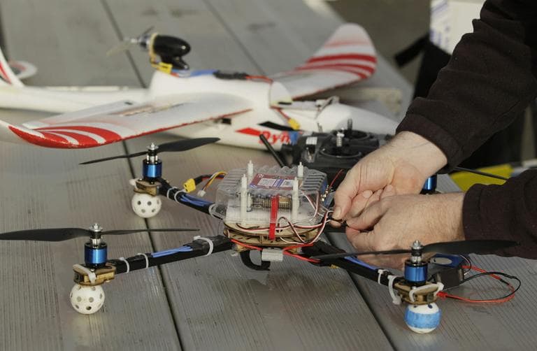 Mark Harrison prepares his Arcti Copter 5 drone for flight over a waterfront park in Berkeley, Calif. (AP)