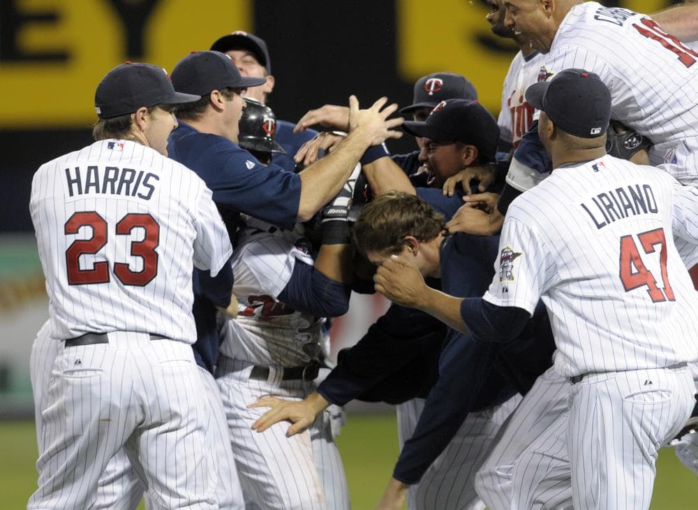 The last time Major League Baseball had a one-game playoff, the Twins defeated the Tigers and won a spot in the 2009 postseason. That will happen twice a year now, as each league will feature two wild-card teams squaring off in a new playoff format. (AP)