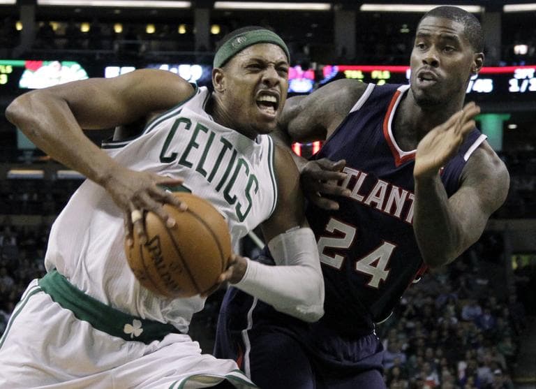 Boston Celtics forward Paul Pierce drives on Atlanta Hawks forward Marvin Williams during the second half Wednesday. (AP) 
