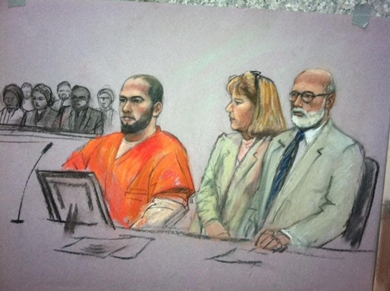 Tarek Mehanna in court with his attorneys, Thursday (Jane Collins for WBUR)