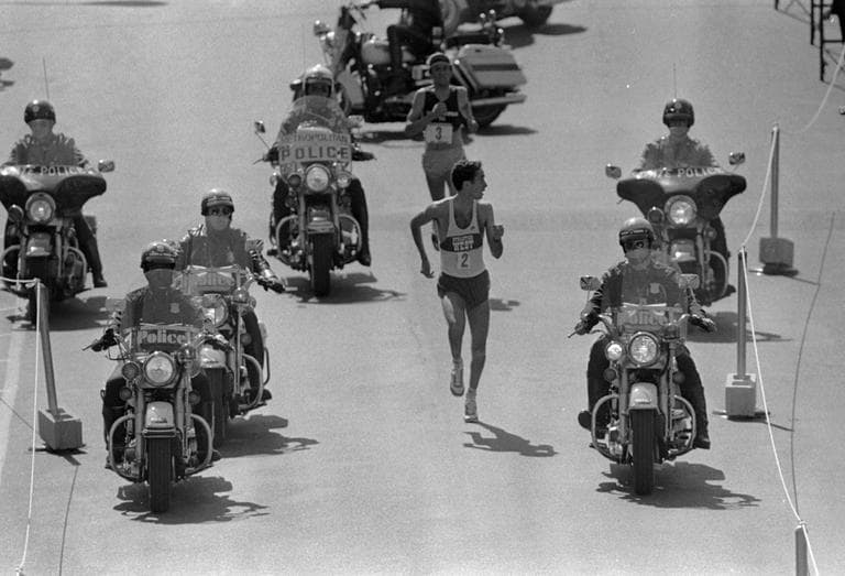 Alberto Salazar of Wayland, Mass., looks over his shoulder to check on Dick Beardsley, rear, of Rush City, Minnesota, as they neared the finish line April 19, 1982 in the 86th annual Boston Marathon. Salazar went on to win. (AP)