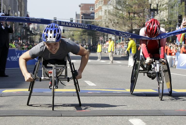 Women&#039;s wheelchair winner Shirley Reilly of the United States, left, crosses the finish line ahead of second-place finisher Wakako Tsuchida of Japan in the 2012 Boston Marathon. (AP)