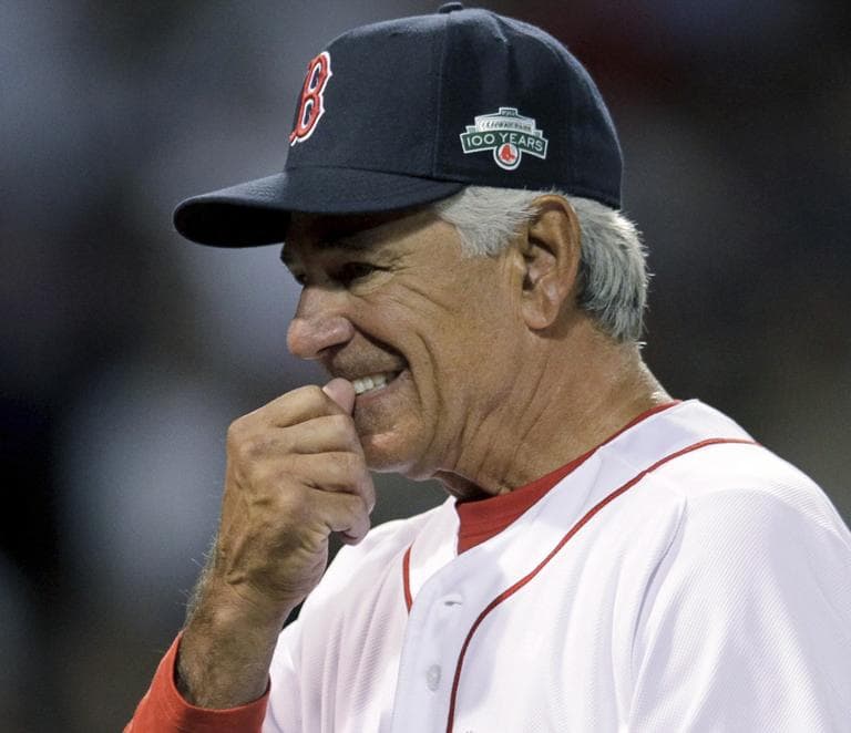 Boston Red Sox manager Bobby Valentine walks back to the dugout after removing Jon Lester in the third inning against the Texas Rangers in Boston, Tuesday. (AP)