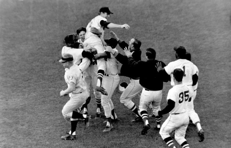 Sox pitcher Jim Lonborg is lifted by his teammates following their 5-3 victory over the Twins at Fenway Park, Oct. 1, 1967. (AP)