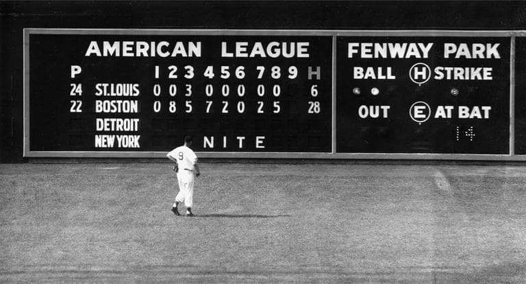 In this June 8, 1950, file photo, Boston Red Sox left fielder Ted Williams views the scoreboard at Fenway Park. (AP)