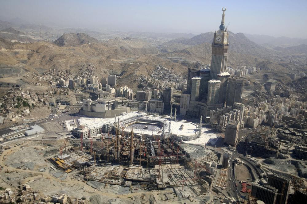 This aerial image made from a helicopter shows Muslim pilgrims moving around the Kaaba, the black cube seen at center, inside the Grand Mosque, during the annual Hajj in the Saudi holy city of Mecca, Saudi Arabia, Monday, Nov. 7, 2011. The annual Islamic pilgrimage draws 2.5 million visitors each year, making it the largest yearly gathering of people in the world. (AP)