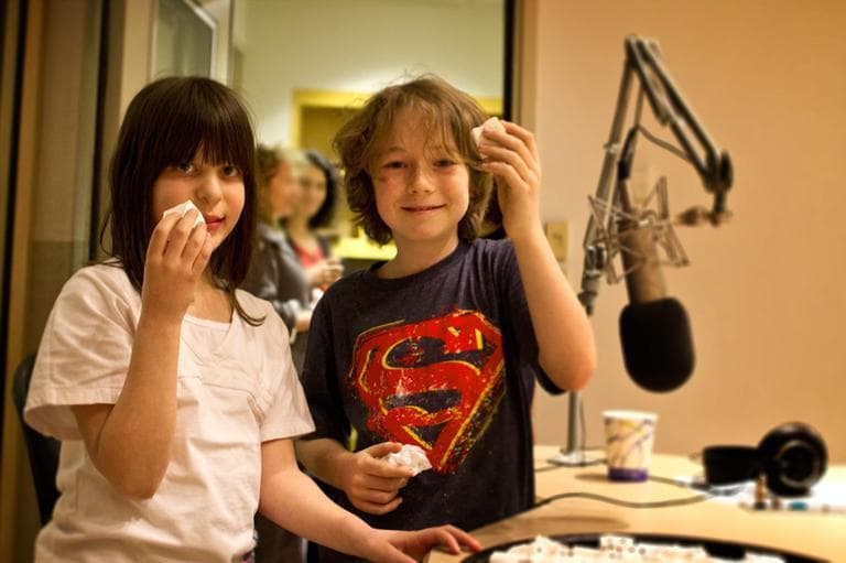 Jamie Wolpert (left) and Sammy Haines (right) test some marshmallows for us at Here &amp; Now studios at WBUR in Boston. (Jesse Costa/Here &amp; Now)