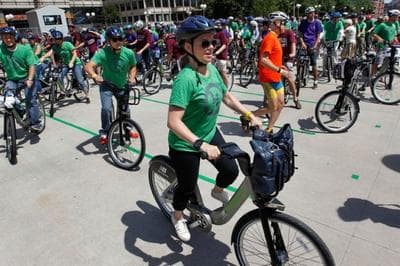 Riders all virtuously wearing their helmets when the Hubway bike-sharing program launched last summer (AP photo)