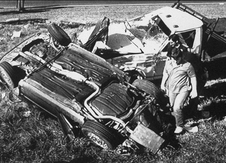 Police officials and others examine the wreckage of three-vehicle accident four miles west of Oxford, Mississippi on Thursday, March 26, 1987, that killed five University of Mississippi students who were participating in a sorority walk-a-thon. Several others were injured in the accident. (AP)