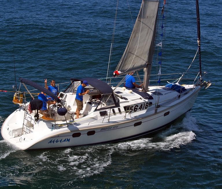 This Friday, April 27, 2012, photo shows the Aegean with crew members at the start of a 125-mile Newport Beach, Calif. to Ensenada, Mexico yacht race. The 37-foot Aegean, carrying a crew of four, was reported missing Saturday, the U.S. Coast Guard said. The yacht appeared to have collided at night with a much larger vessel, leaving three crew members dead and one missing. (AP /newportbeach.patch.com, Susan Hoffman)
