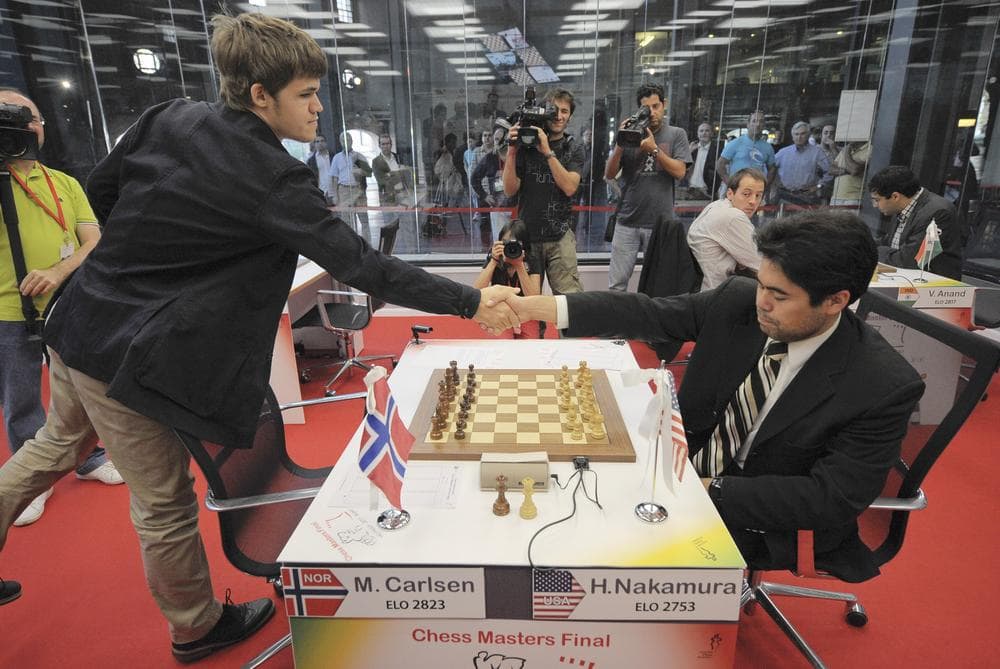 Hikaru Nakamura (r), shown in 2011, is on the verge of breaking a scoring mark set by Bobby Fischer. (AP)