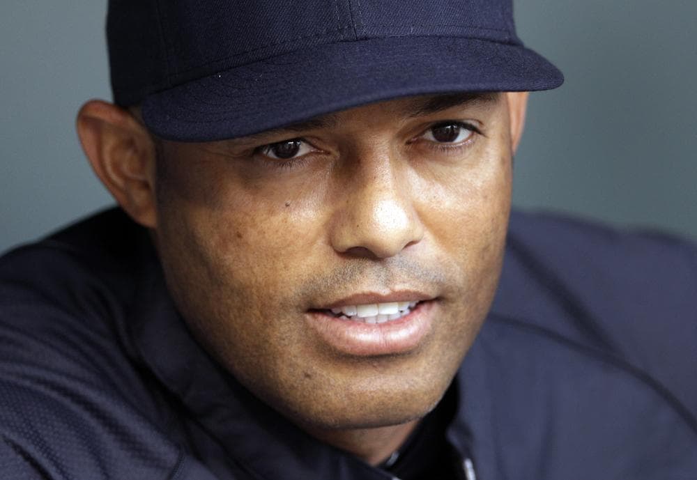 Yankees relief pitcher Mariano Rivera's career might be over after he tore his ACL while shagging balls during batting practice on Thursday.  (AP)