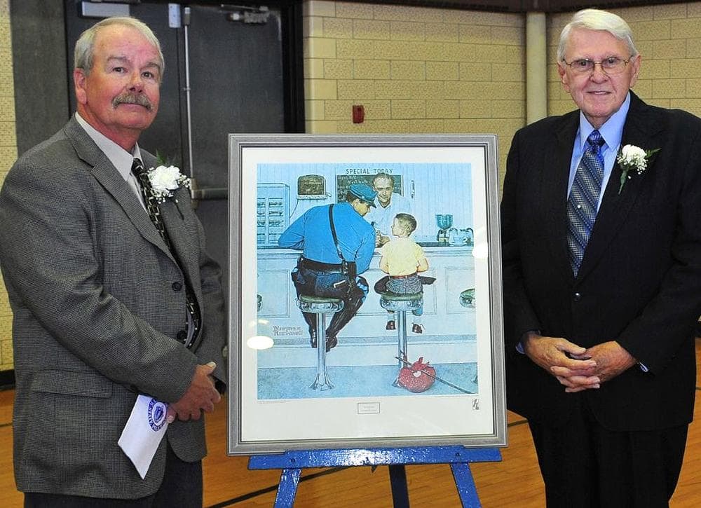 Dick Clemens, right, who posed as the trooper, and Ed Locke, who posed as the boy, stand with Norman Rockwell's &quot;The Runaway&quot; during the 50th anniversary celebration of the painting in 2008 at State Police headquarters. (State Police)