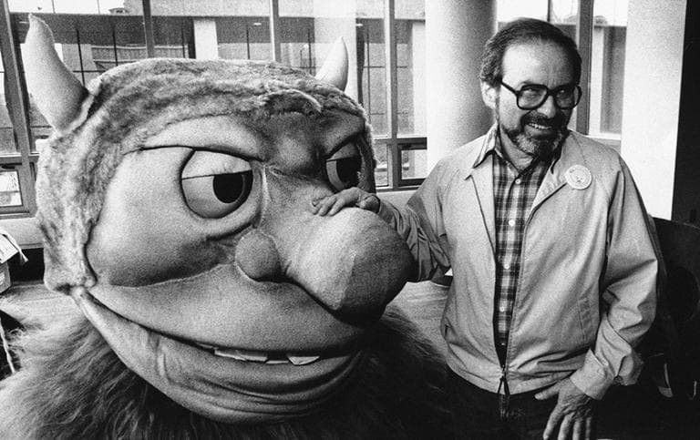 Author Maurice Sendak poses with one of the characters from his book &quot;Where the Wild Things Are,&quot; in 1995. (AP)