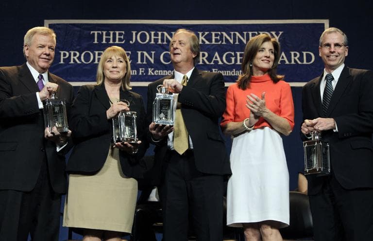 Caroline Kennedy, second from right, applauds as the recipients of the 2012 John F. Kennedy Profile in Courage Awards hold their lanterns at the JFK Library in Boston, Monday, May 7. From left are Michael Streit, former Iowa Supreme Court Justice; Marsha Ternus, former Iowa Supreme Court Chief Justice; David Baker, former Iowa Supreme Court Justice; and Robert Ford, U.S. Ambassador to Syria. (AP)