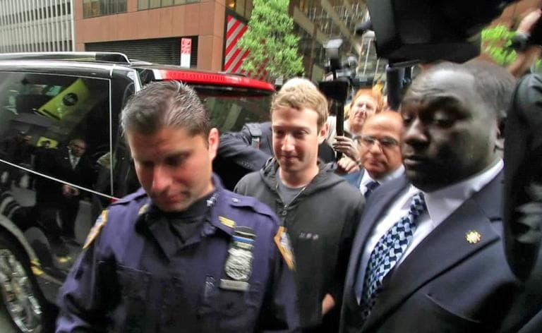 Facebook CEO Mark Zuckerberg arrived to meet with investors in New York on Monday  wearing his iconic hoodie. (AP)