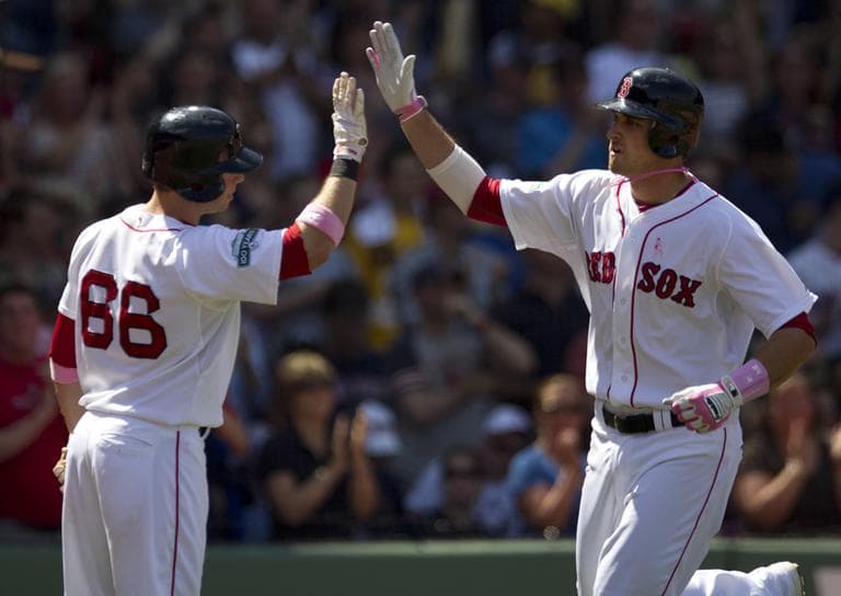 Boston Red Sox&#039;s Will Middlebrooks, right, is welcomed to home plate by teammate Daniel Nava after hitting a home run against Cleveland on Sunday. (AP)