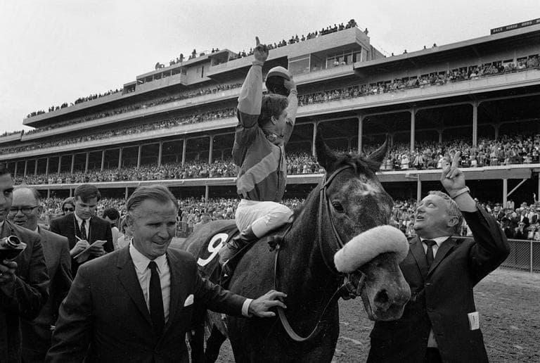 In this 1968 file photo, horse owner Peter Fuller, left, jockey Bob Ussery and trainer Louis Cavalaris Jr. celebrate Dancer's Image's Kentucky Derby win. (AP)