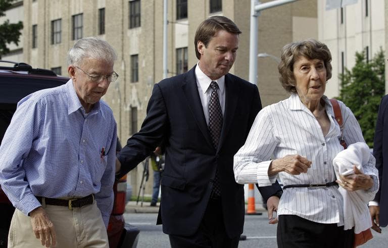 John Edwards, center, and his mother Bobbie Edwards, right, and his father Wallace Edwards, left, arrive at a federal courthouse for John Edwards&#039; trial on charges of campaign corruption in Greensboro, N.C., Wednesday. (AP)