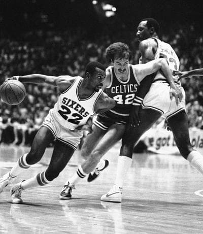 Celtic Chris Ford finds himself blocked as he tries to defend against the 76ers' Andrew Toney (22) as he drives to the basket during playoff action May 16, 1982, in Philadelphia. (AP)