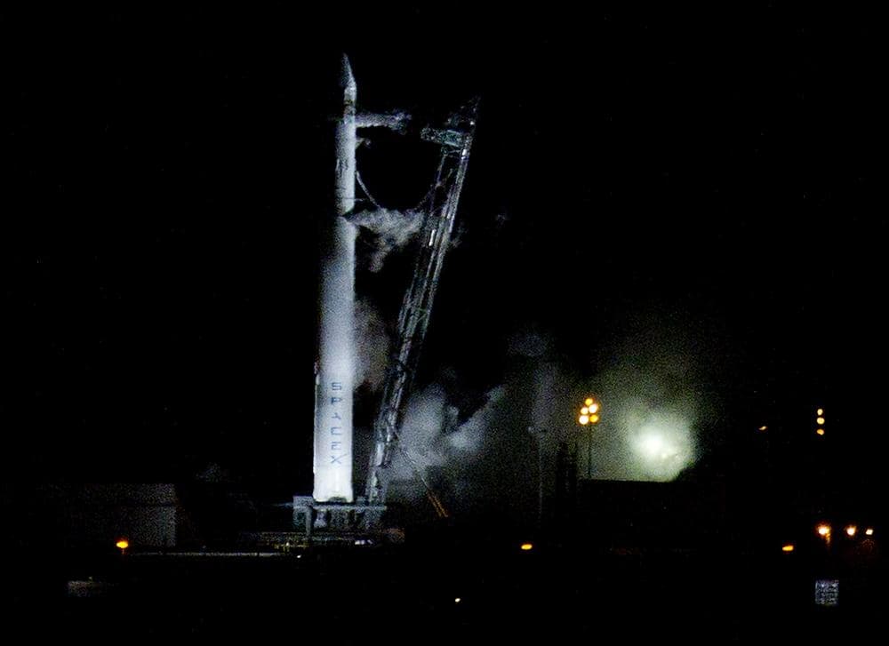 The Falcon 9 SpaceX rocket sits on the launch pad at complex 40 moments after the launch was aborted due to technical problems at the Cape Canaveral Air Force Station in Cape Canaveral, Fla., early Saturday.(AP) 