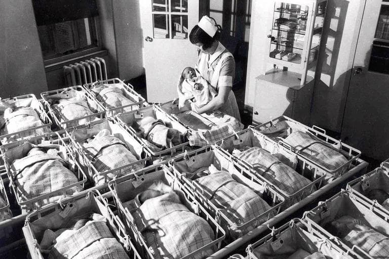 A nurse holds a baby in the nursery of the Pennsylvania Hospital in this 1930 photo. The country has reached a historic tipping point &mdash; with minority births constituting more than half of all births, the U.S. Census Bureau reported this month. (AP)