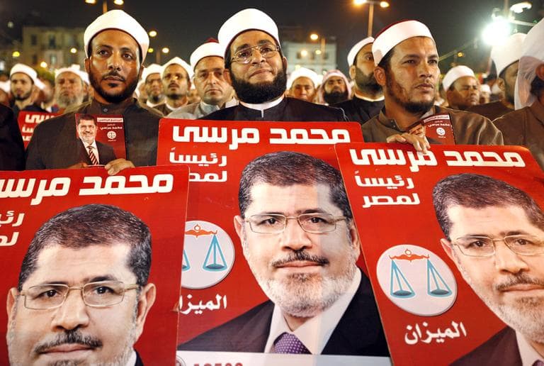 Several hundreds Imams listen to Muslim Brotherhood's presidential candidate Mohammed Morsi at a rally in Cairo, Egypt on Sunday. (AP)