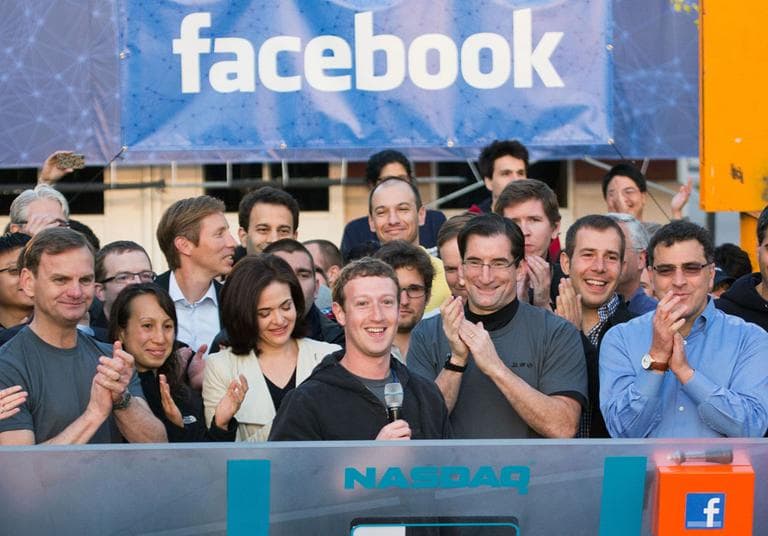 Facebook founder, Chairman and CEO Mark Zuckerberg, center, rings the Nasdaq opening bell from Facebook headquarters in Menlo Park, May 18. (AP)