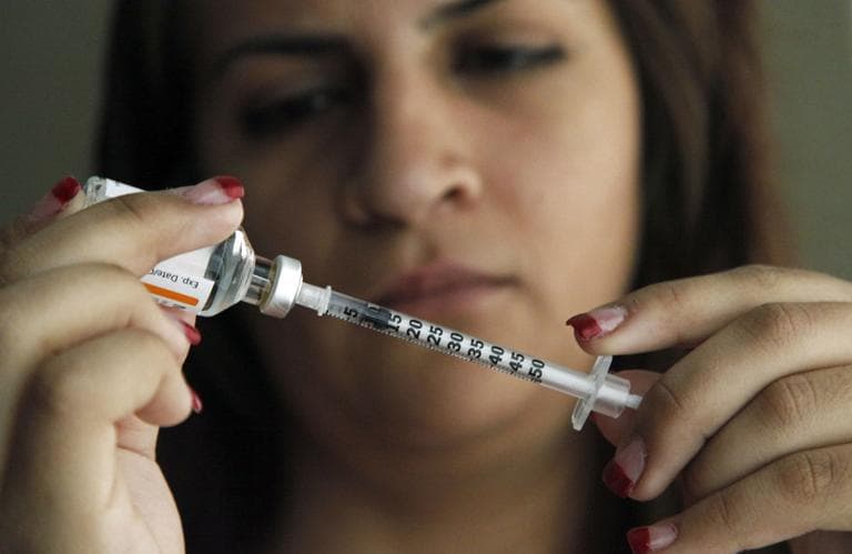 Judith Garcia, 19, fills a syringe as she prepares to give herself an injection of insulin at her home in the Los Angeles suburb of Commerce, Calif., Sunday, April 29, 2012. A major study, released Sunday, tested several ways to manage blood sugar in teens newly diagnosed with diabetes and found that nearly half of them failed within a few years and 1 in 5 suffered serious complications. Garcia still struggles to manage her diabetes with metformin and insulin years after taking part in the study at Children's Hospital Los Angeles. (AP)