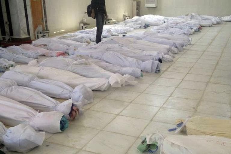 This unverified citizen journalism image provided by Shaam News Network purports to show shrouded dead bodies following a Syrian government assault on Houla, Syria. (AP)